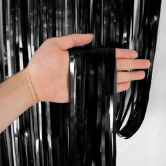 Black foil curtain backdrop for birthday and party decoration with metallic fringe design