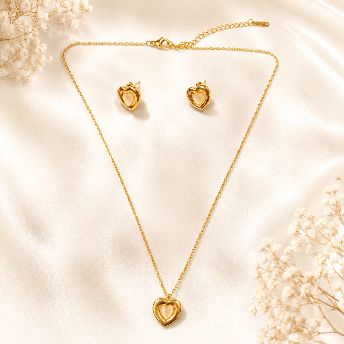 Anti Tarnish gold heart pendant necklace with matching heart earrings jewelry set for women on bright white background