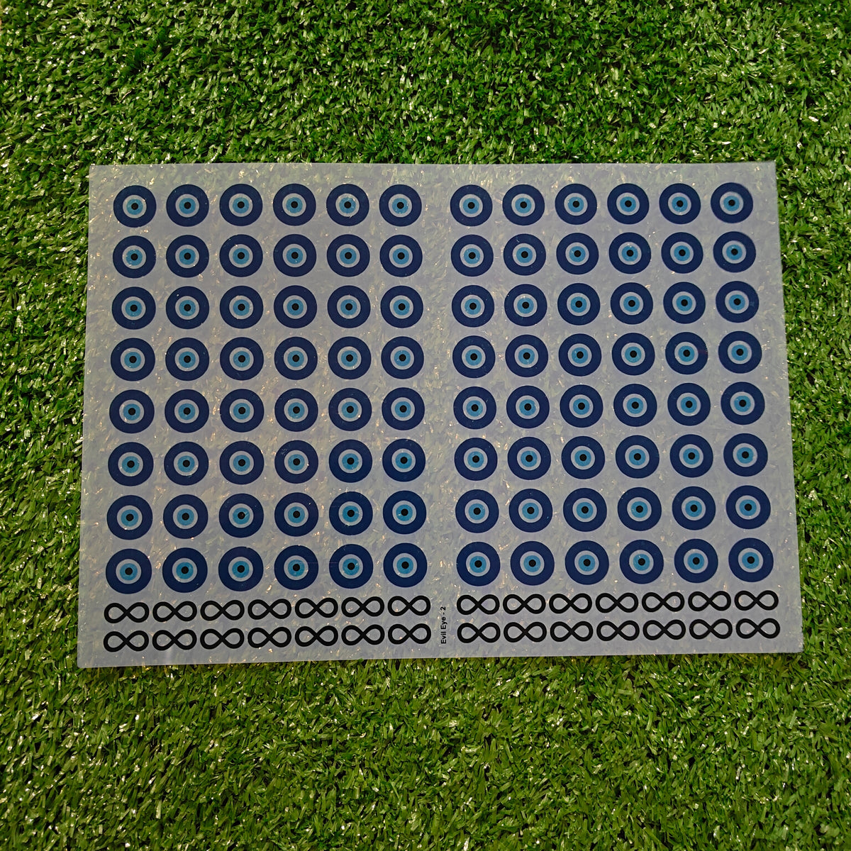 EVIL EYE INSERT SHEET 2